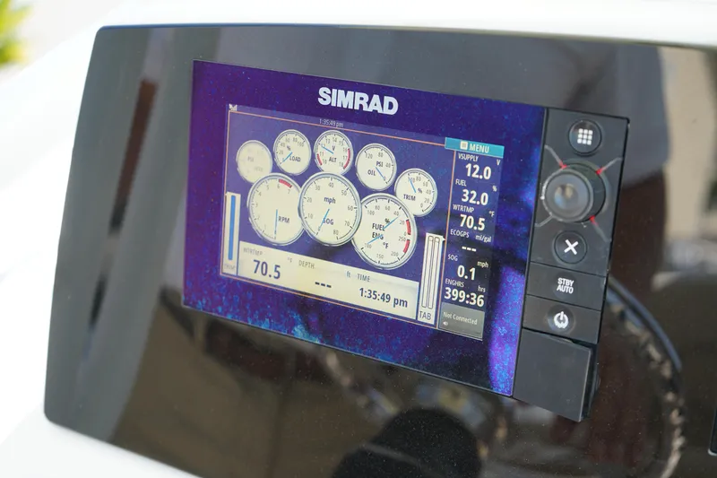 Slide: The Image of Simrad display on 2016 Sportsman Heritage 211 Center Console boat dashboard. - 19