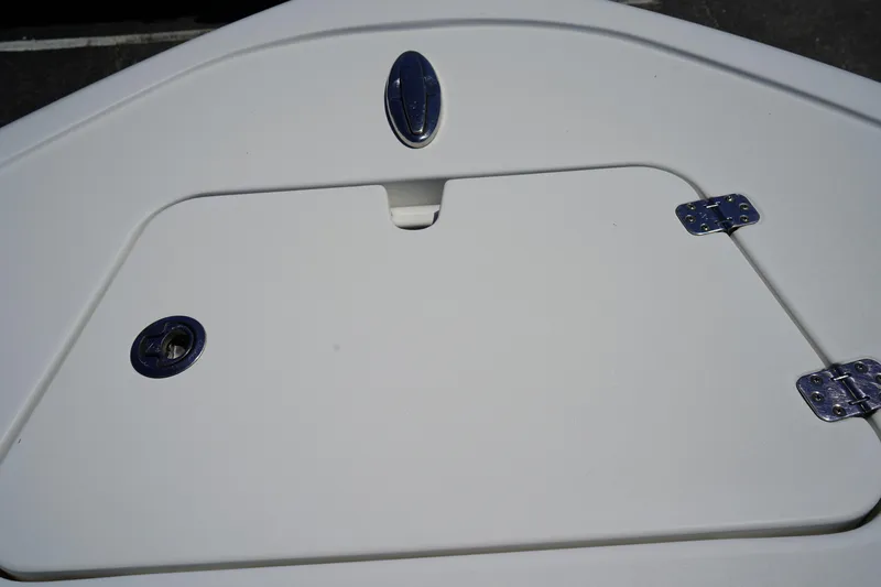 Slide: The Image of 2016 Sportsman Heritage 211 Center Console boat hatch with hinges and handle. - 39