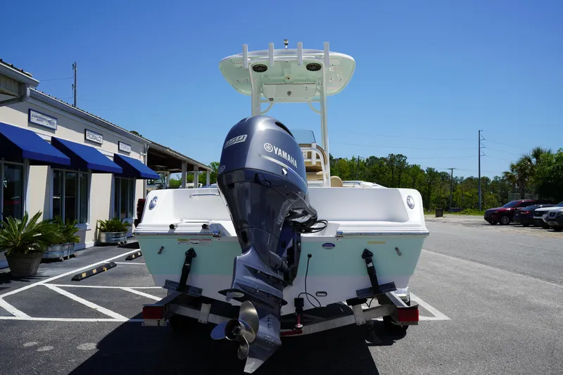 Slide: The Image of 2016 Sportsman Heritage 211 Center Console boat with Yamaha engine on trailer. - 4