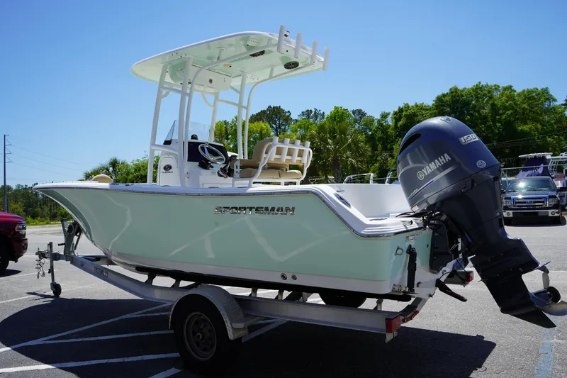 Slide: The Image of 2016 Sportsman Heritage 211 Center Console boat on trailer, featuring Yamaha outboard motor. - 5