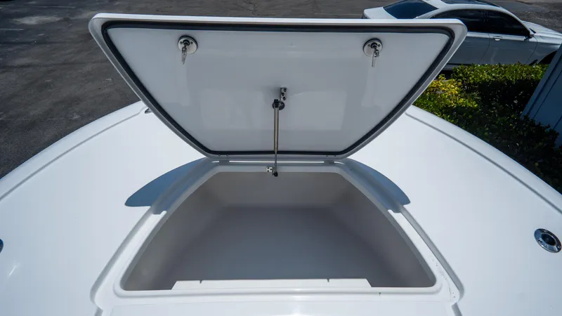 Slide: The Image of Open storage compartment on 2025 Tidewater 2500 Carolina Bay boat. - 25