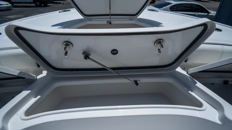 Slide: The Image of Open storage compartment on 2025 Tidewater 2500 Carolina Bay boat. - 27