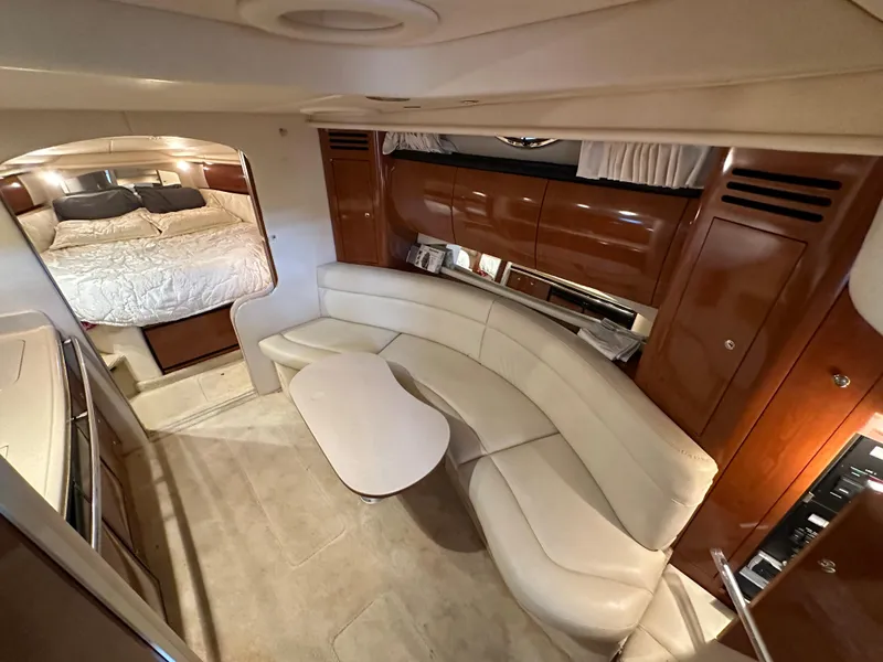 Slide: The Image of Luxurious interior of 2002 Sea Ray 360 Sundancer yacht with elegant seating and cozy bedroom. - 34