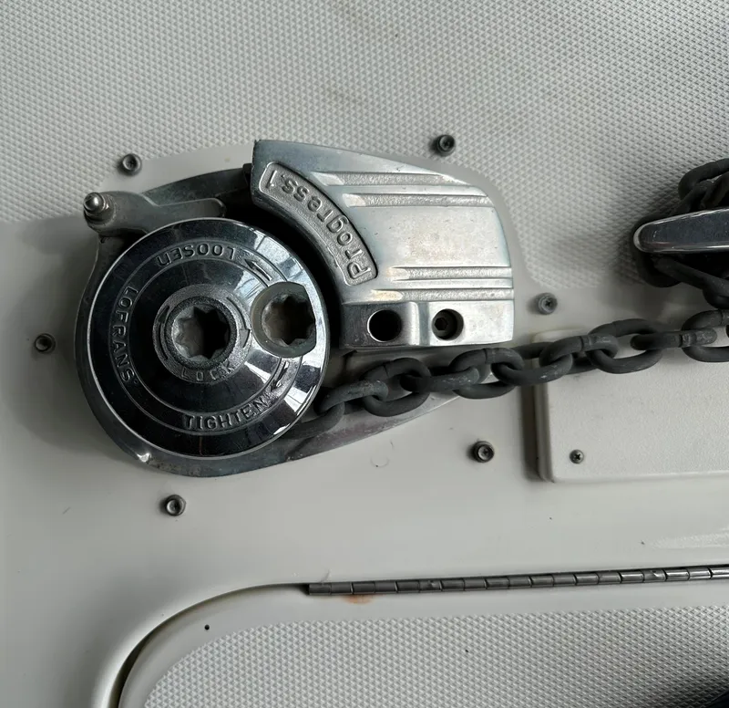 Slide: The Image of Anchor windlass on 2002 Sea Ray 360 Sundancer boat deck. - 48