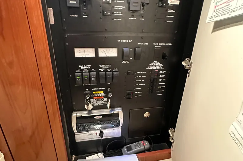 Slide: The Image of Electrical control panel inside a 2002 Sea Ray 360 Sundancer yacht. - 50