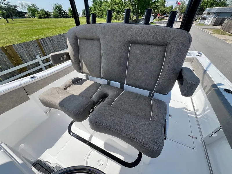 Slide: The Image of 2025 Sea Hunt Gamefish 30 boat seating with gray upholstery and armrests. - 10