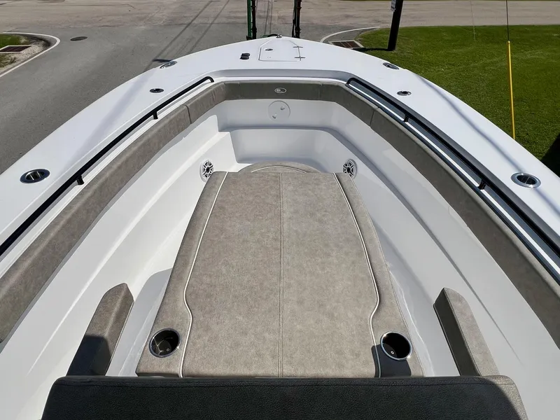 Slide: The Image of 2025 Sea Hunt Gamefish 30 boat with coffin box, showcasing spacious deck and seating area. - 14