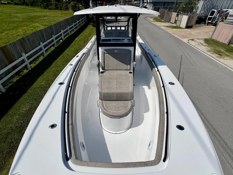 Slide: The Image of 2025 Sea Hunt Gamefish 30 with Coffin Box, sleek design, spacious deck, and modern features. - 16