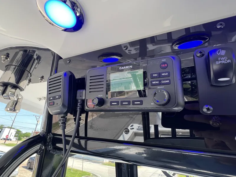 Slide: The Image of Garmin marine electronics on 2025 Sea Hunt Gamefish 30 boat dashboard with blue LED lights. - 18