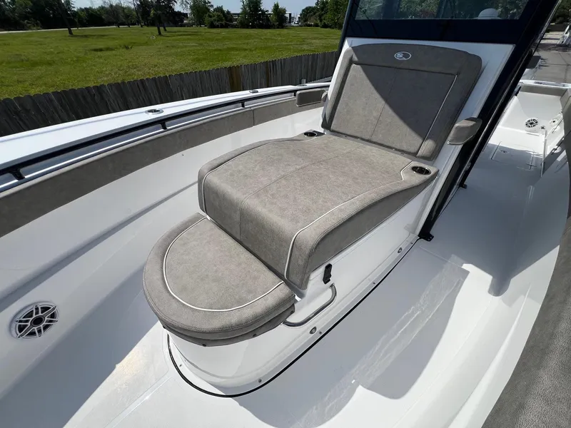 Slide: The Image of 2025 Sea Hunt Gamefish 30 with Coffin Box, featuring a spacious cushioned seating area. - 20