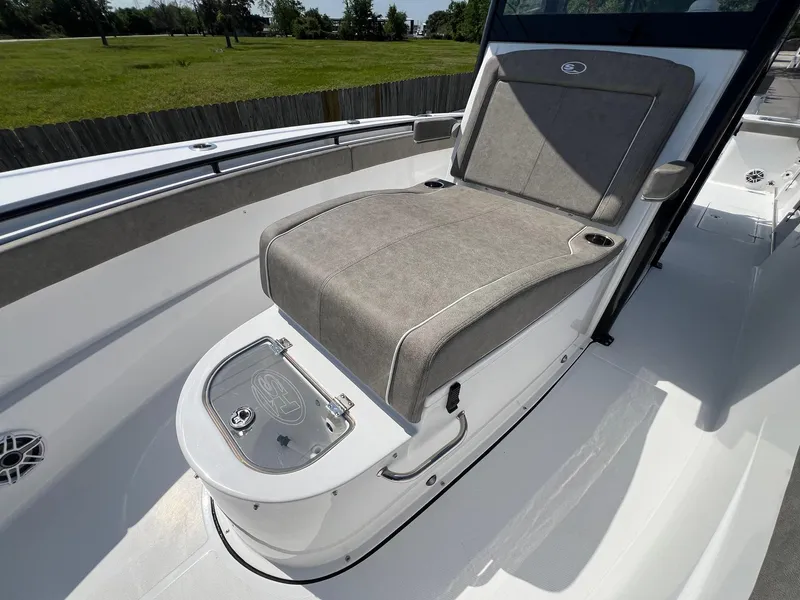 Slide: The Image of 2025 Sea Hunt Gamefish 30 with Coffin Box, featuring a comfortable seating area. - 21