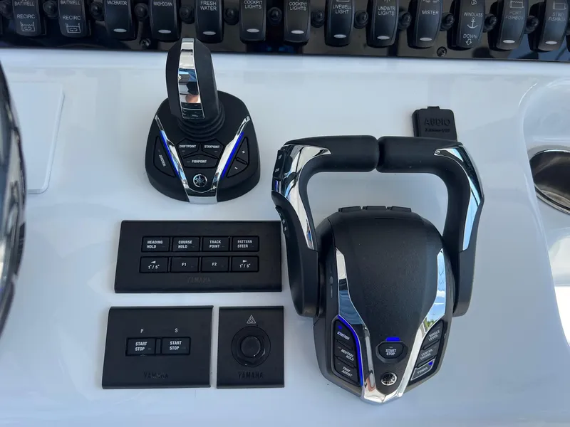 Slide: The Image of Control panel of 2025 Sea Hunt Gamefish 30 with advanced throttle and joystick. - 22
