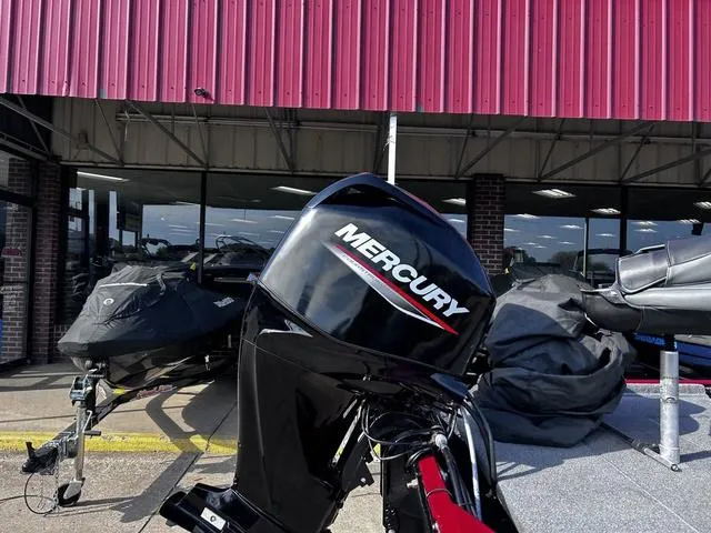 Slide: The Image of 2021 Tracker BASS TRACKER® Classic XL with Mercury engine outside a dealership. - 3