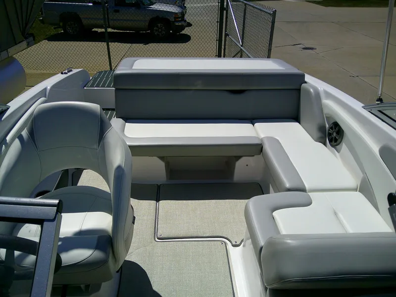 Slide: The Image of 2020 Regal 1900 ES Bowrider interior with white seating and spacious layout. - 12