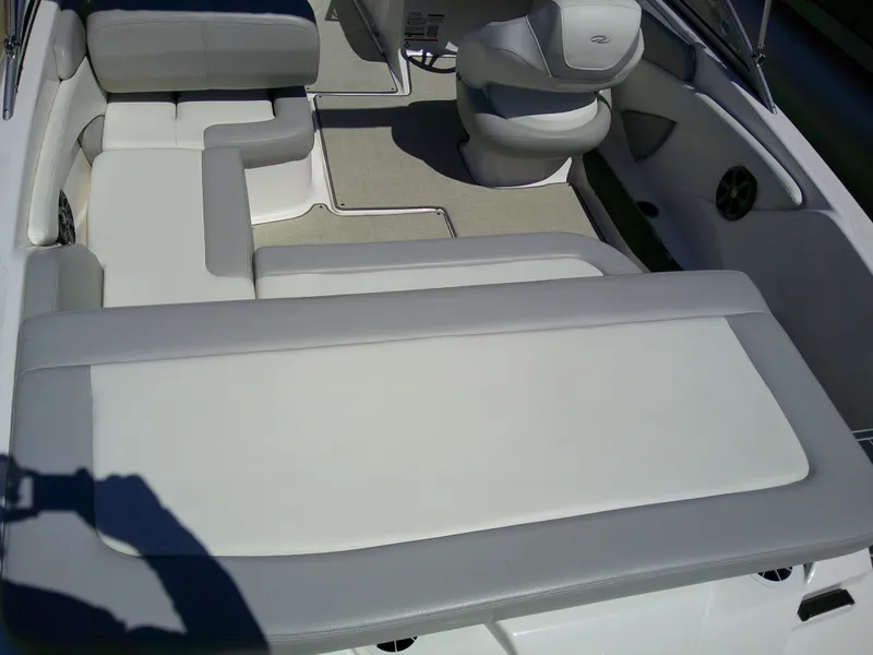 Slide: The Image of 2020 Regal 1900 ES Bowrider interior with gray and white seating. - 5