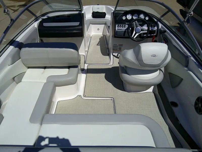 Slide: The Image of 2020 Regal 1900 ES Bowrider interior with seating and steering console. - 6