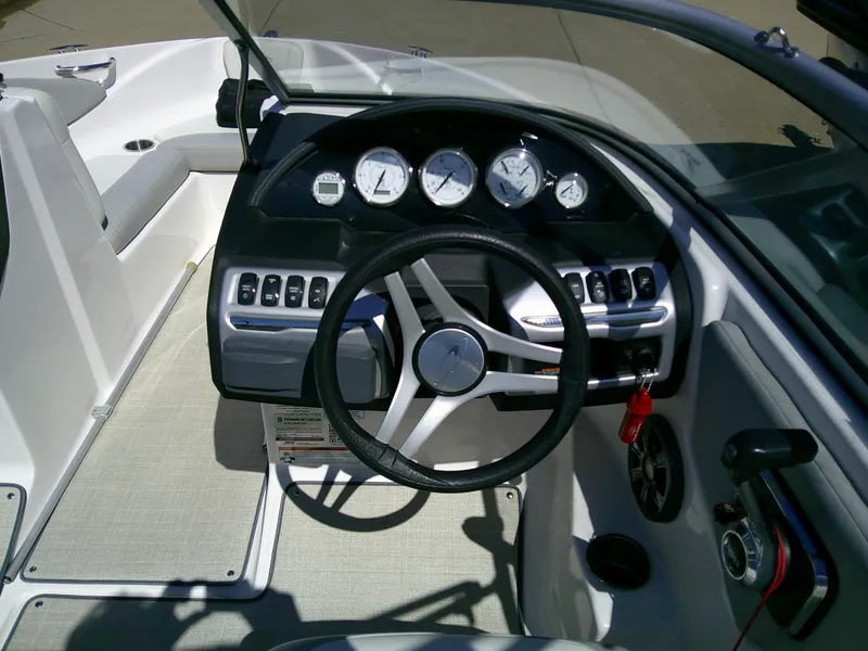 Slide: The Image of 2020 Regal 1900 ES Bowrider dashboard with steering wheel and instrument panel. - 8