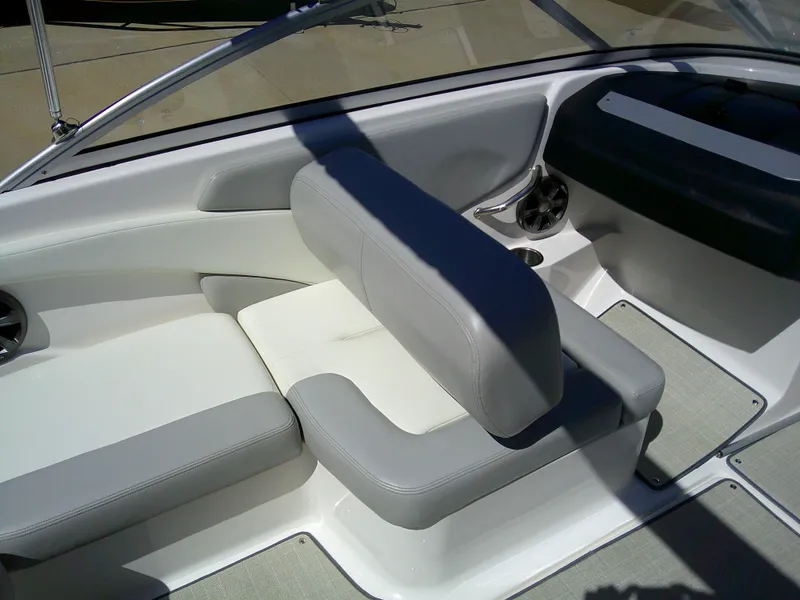 Slide: The Image of 2020 Regal 1900 ES Bowrider interior with gray and white seating, showcasing modern design. - 9