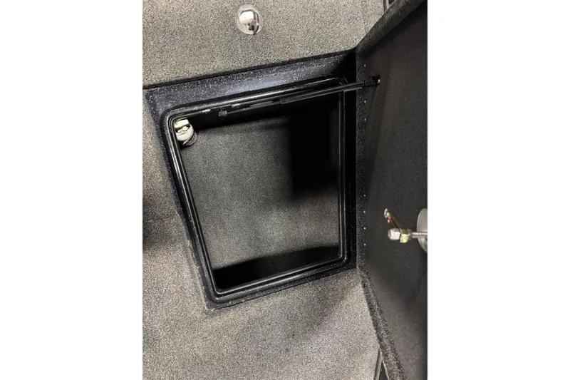 Slide: The Image of Open storage compartment in 2019 Nitro ZV21 boat interior. - 21