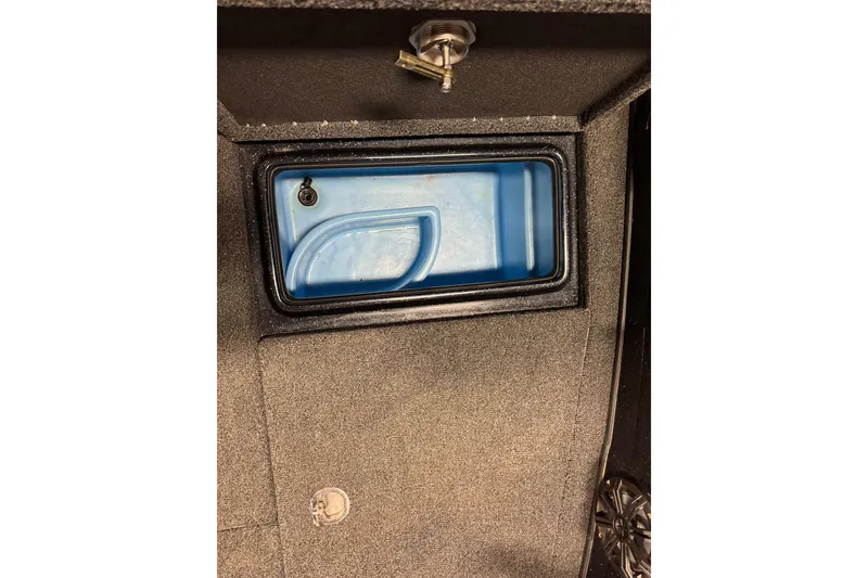 Slide: The Image of 2019 Nitro ZV21 boat compartment with blue interior and secure latch. - 22