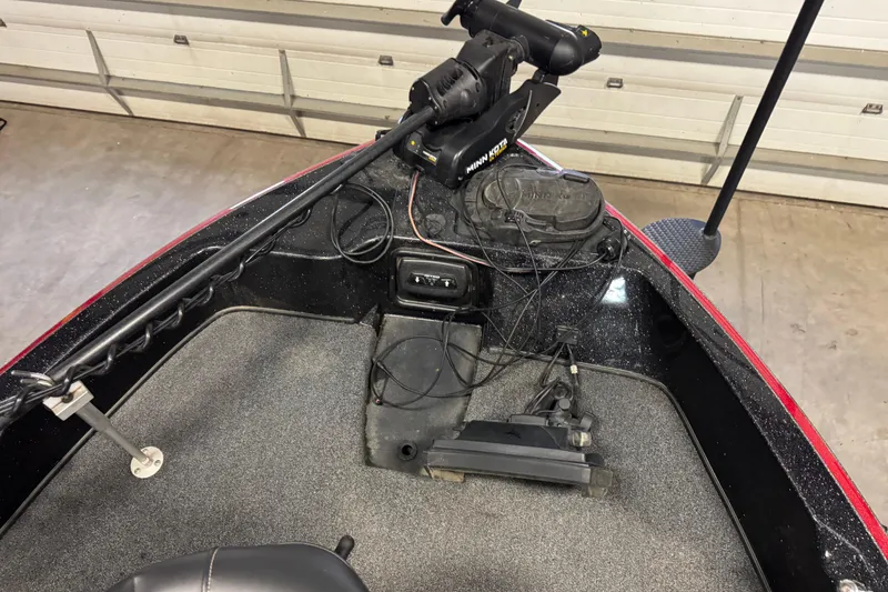Slide: The Image of 2019 Nitro ZV21 boat deck with Minn Kota trolling motor and control panel. - 26