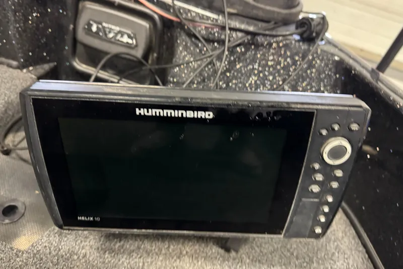 Slide: The Image of Humminbird Helix 10 fish finder on a 2019 Nitro ZV21 boat dashboard. - 27