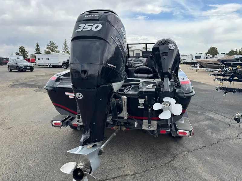 Slide: The Image of 2019 Nitro ZV21 boat with Mercury Verado engine in a garage setting. - 3