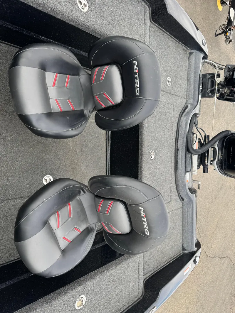 Slide: The Image of 2019 Nitro ZV21 boat with Mercury Verado engine in a garage setting. - 4