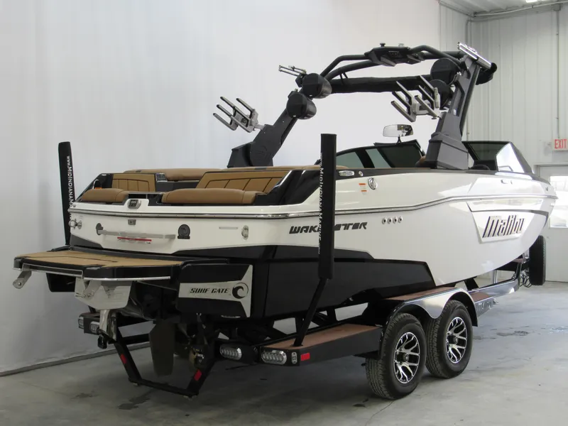 Slide: The Image of 2022 Malibu Wakesetter 23 LSV boat on trailer in indoor storage. - 3