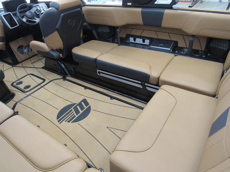 Slide: The Image of 2022 Malibu Wakesetter 23 LSV interior with tan leather seating and sleek design. - 5