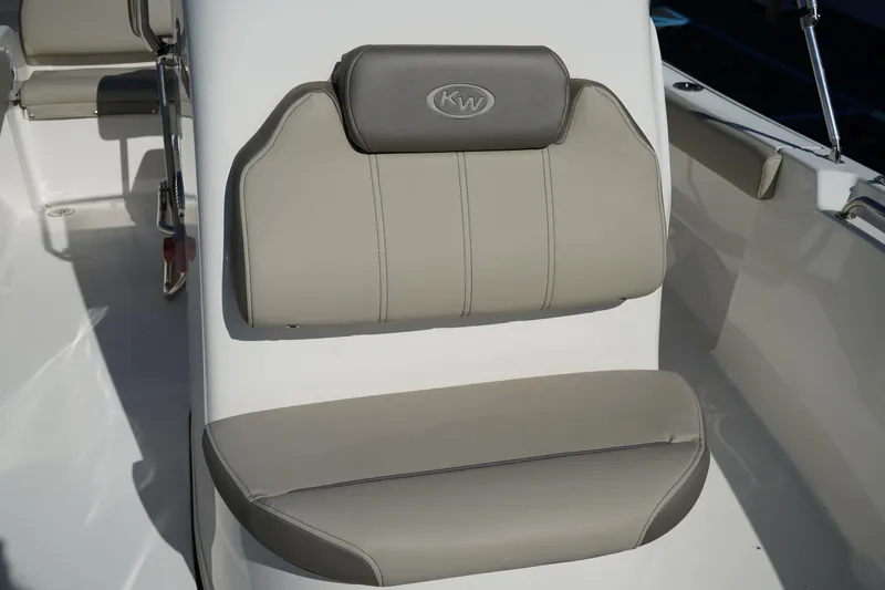 Slide: The Image of 2023 Key West 189 FS boat seat with gray upholstery and KW logo. - 20
