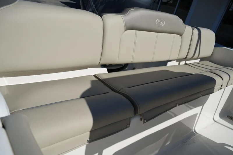 Slide: The Image of 2023 Key West 189 FS boat seating with beige upholstery. - 8