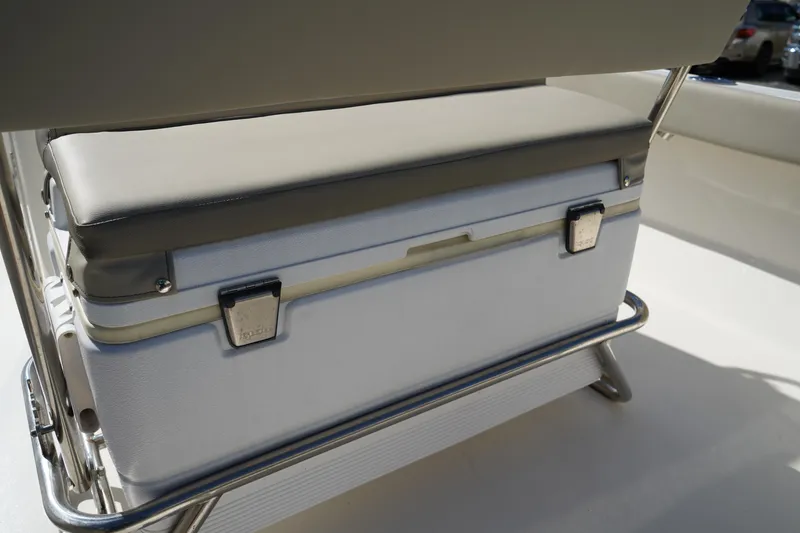 Slide: The Image of 2023 Key West 189 FS boat seat with integrated storage compartment. - 9