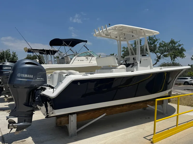 Slide: The Image of 2015 Sea Hunt Ultra 234 boat with Yamaha engine on display. - 4