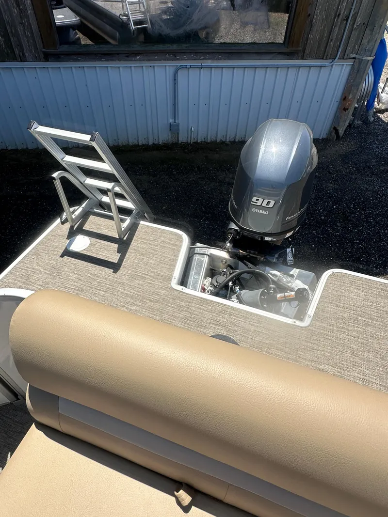 Slide: The Image of 2025 Godfrey Xperience 2086 CXP boat with 90 HP motor and ladder. - 14