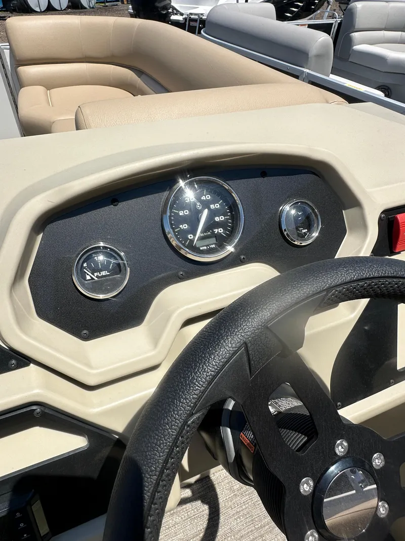 Slide: The Image of Dashboard of 2025 Godfrey Xperience 2086 CXP pontoon boat with steering wheel and gauges. - 17