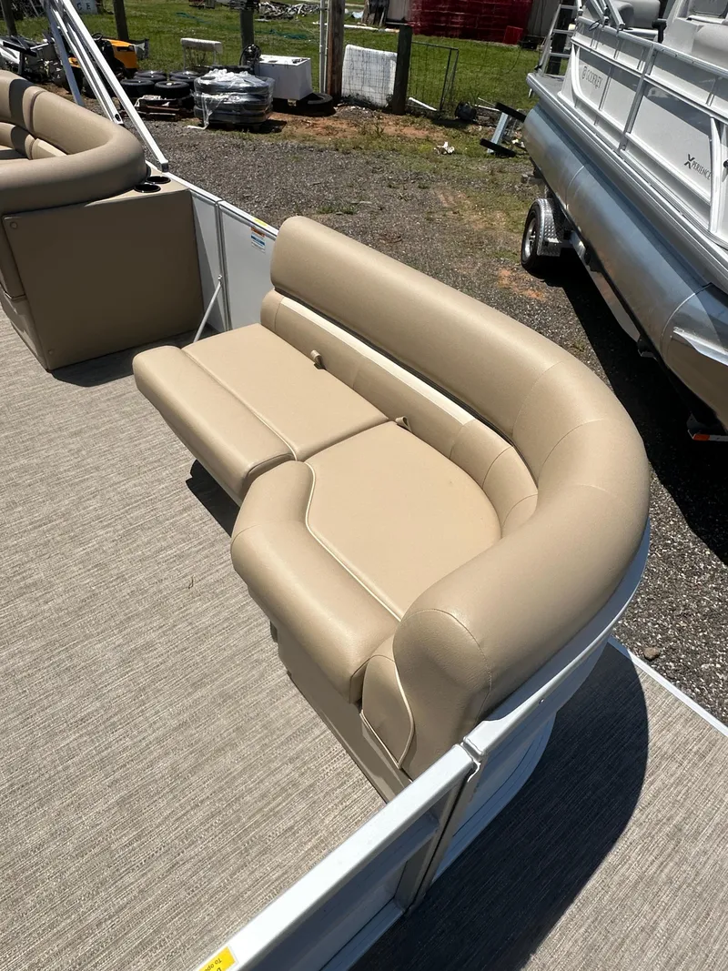 Slide: The Image of Beige seating on 2025 Godfrey Xperience 2086 CXP pontoon boat, outdoor setting. - 9