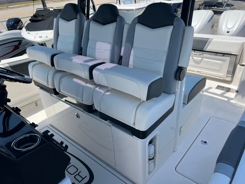 Slide: The Image of 2025 Robalo R300 Center Console boat seating with modern design and comfortable upholstery. - 18