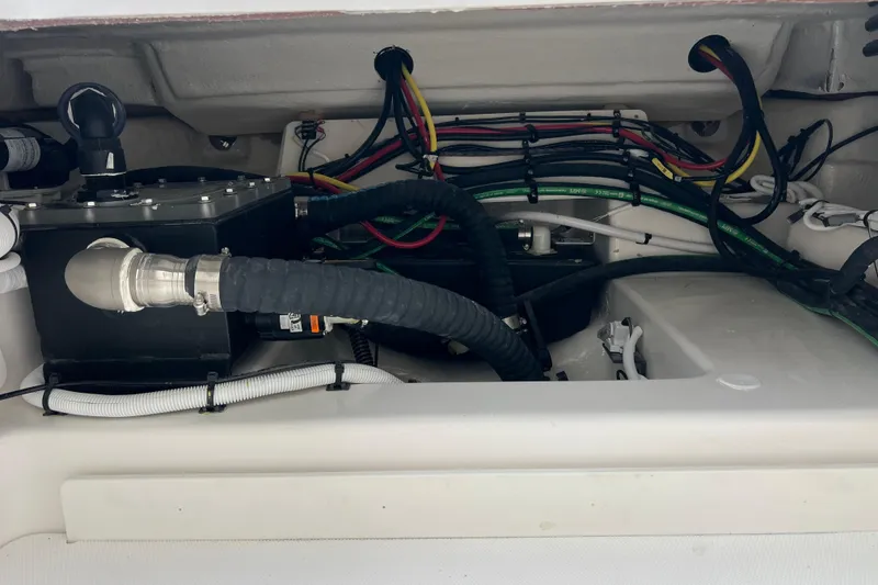 Slide: The Image of Interior view of Robalo R300 Center Console 2025 boat engine. - 25