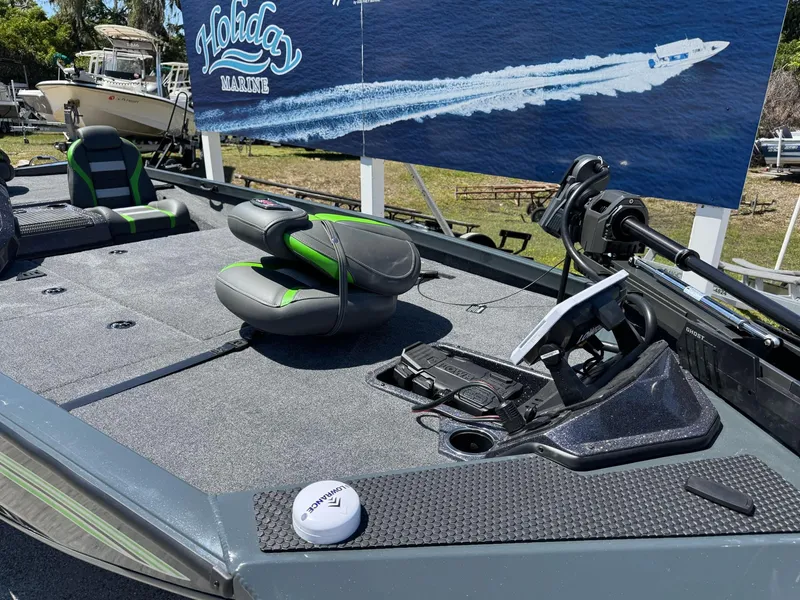 Slide: The Image of 2025 Ranger RT188P boat deck with seating and control panel, displayed outdoors. - 5