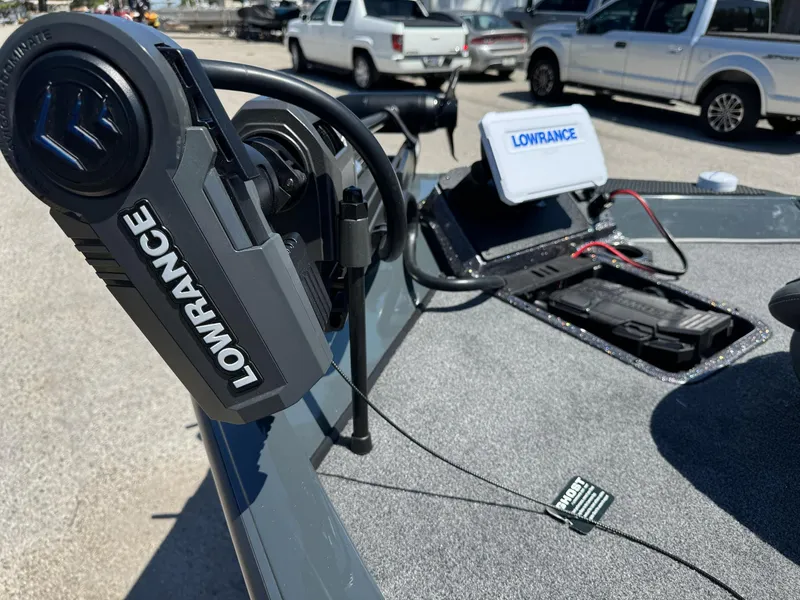 Slide: The Image of 2025 Ranger RT188P boat with Lowrance equipment, parked in a lot. - 7