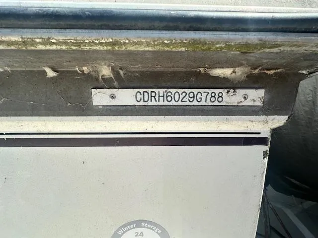 Slide: The Image of 1988 Carver 2767 Santego boat with visible hull identification number. - 8