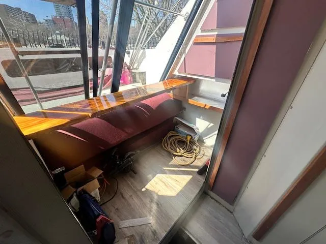 Slide: The Image of Interior of 1988 Carver 2767 Santego boat with seating and storage. - 20