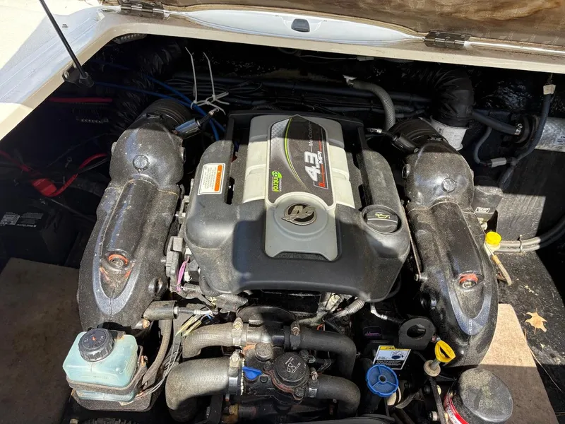 Slide: The Image of 2013 Stingray 208 LR engine compartment with 4.3L V6 engine, detailed view. - 4