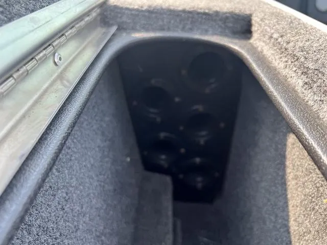 Slide: The Image of Interior compartment of a 2020 Alumacraft Trophy 185 boat, showing storage space. - 14