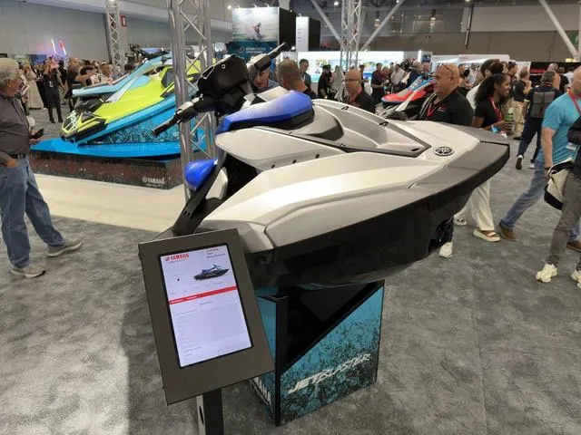 Slide: The Image of 2025 Yamaha WaveRunner Jetblaster 2-Up on display at a crowded exhibition. - 7