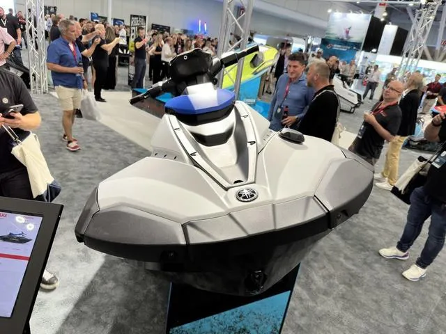 Slide: The Image of 2025 Yamaha WaveRunner Jetblaster 2-Up on display at a crowded exhibition. - 8