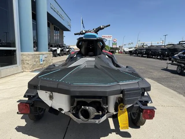 Slide: The Image of 2025 Yamaha Waverunner Jetblaster parked outside dealership on sunny day. - 3