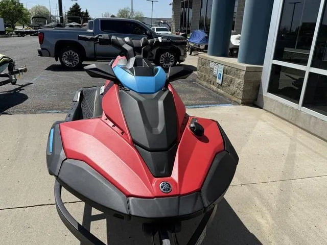 Slide: The Image of 2025 Yamaha Waverunner Jetblaster in red and black, parked outdoors near a building. - 6
