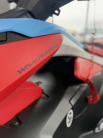 Slide: The Image of 2025 Yamaha Waverunner Jetblaster, close-up of red and blue design details. - 12